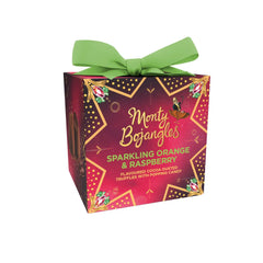 Festively enchanting present gift box of sparkling orange & raspberry flavoured cocoa truffles with popping candy Jag Couture London - New York