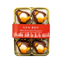 Milk chocolate penguin figures with hazelnut filling in cello pack