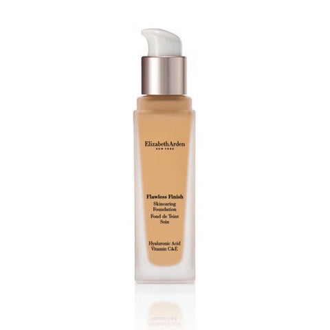 Elizabeth Arden Flawless Finish Foundation in shade 310c, displayed with packaging, by Jag Couture London New York.