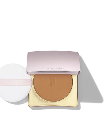 Elizabeth Arden Flawless Finish Skincar Maq Powder by Jag Couture London - New York, compact with smooth, natural-looking face powder.