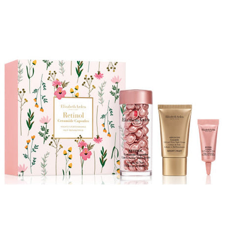 Three Elizabeth Arden Retinol Ceramide capsules set by Jag Couture London, showing sleek, amber-colored capsules in a clear container.