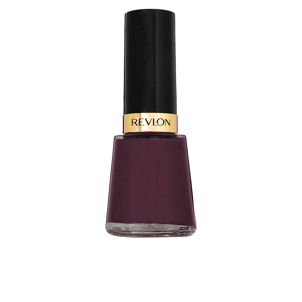 Revlon Nail Enamel 570 Vixen in 14.7ml bottle, featuring glossy red nail polish with the Jag Couture London - New York branding.