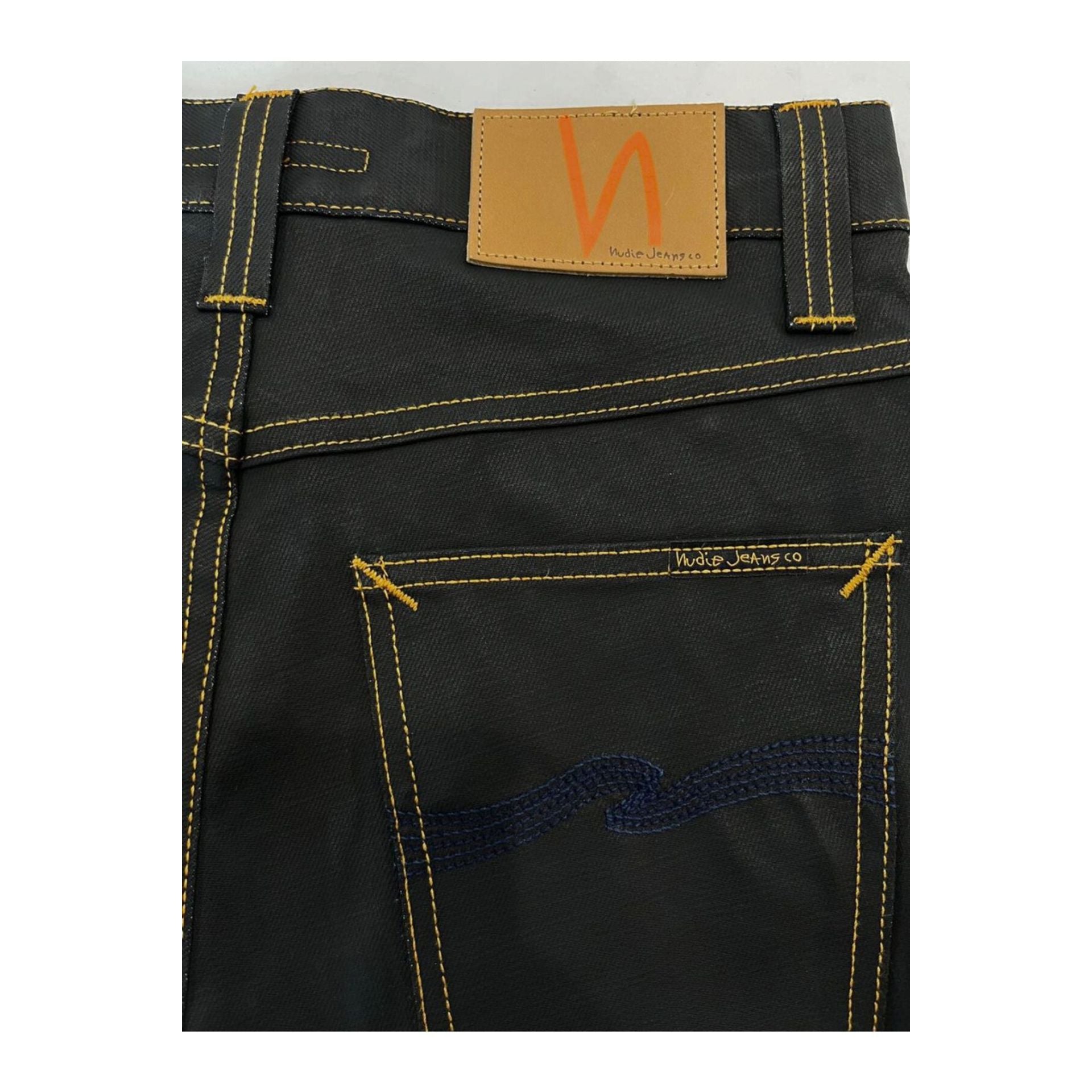 Nudie Jeans NJ2943_4GREMTIM NeroBlack denim jeans by Jag Couture London New York, showcasing the slim fit and dark black wash.