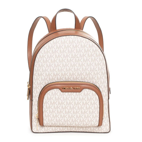 Michael Kors vanilla handbag with silver hardware, featuring structured design and logo details, displayed on a neutral background.