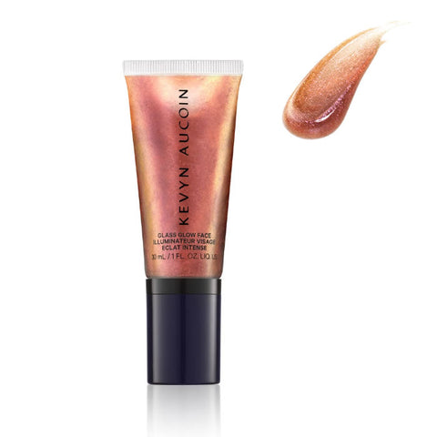 Kevyn Aucoin Glass Glow Face Cosmic Flame highlighter in 30ml, with a luminous, radiant finish in a sleek glass bottle.