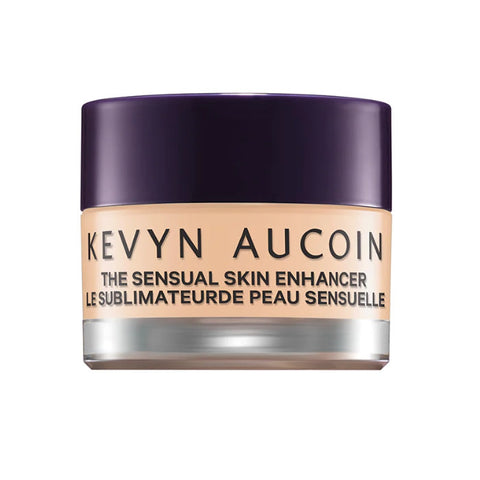 Kevyn Aucoin Sensual Skin Enhancer Concealer Sx 5 tube, a luxurious makeup product for flawless skin, with sleek packaging.