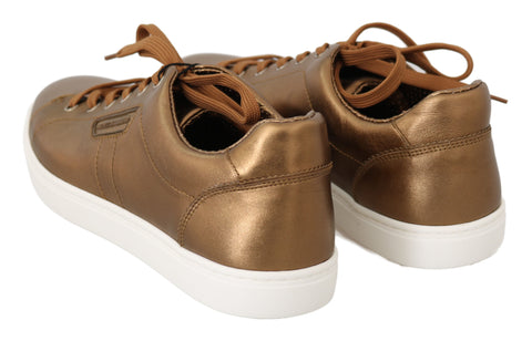 Gold leather men's casual sneakers by Dolce & Gabbana with stylish design and comfortable fit.