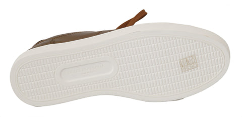 Gold leather men's casual sneakers by Dolce & Gabbana with white rubber soles and stylish design.
