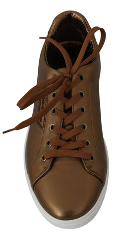 Gold leather men's casual sneakers by Dolce & Gabbana, featuring stylish design and comfortable fit.