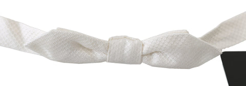 White 100% silk slim adjustable men’s neck tie with bow tie design by Dolce & Gabbana.