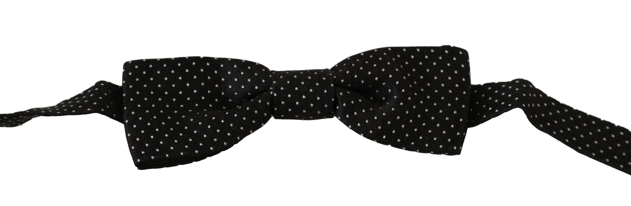 Black silk bow tie with white polka dots, adjustable neck strap, by Dolce & Gabbana, designed for men's formal wear.