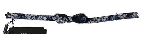 Navy blue floral slim adjustable bow tie for men by Dolce & Gabbana, featuring elegant floral pattern and classic design.