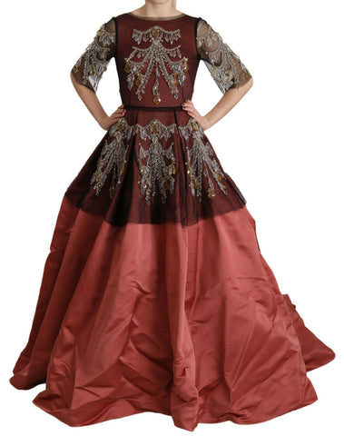 Elegant silk princess gown by Dolce & Gabbana featuring a crystal chandelier-inspired design and flowing fabric.