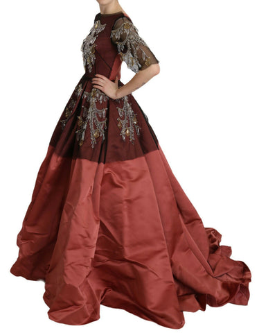 Elegant silk princess gown by Dolce & Gabbana featuring a crystal chandelier-inspired design and flowing fabric.
