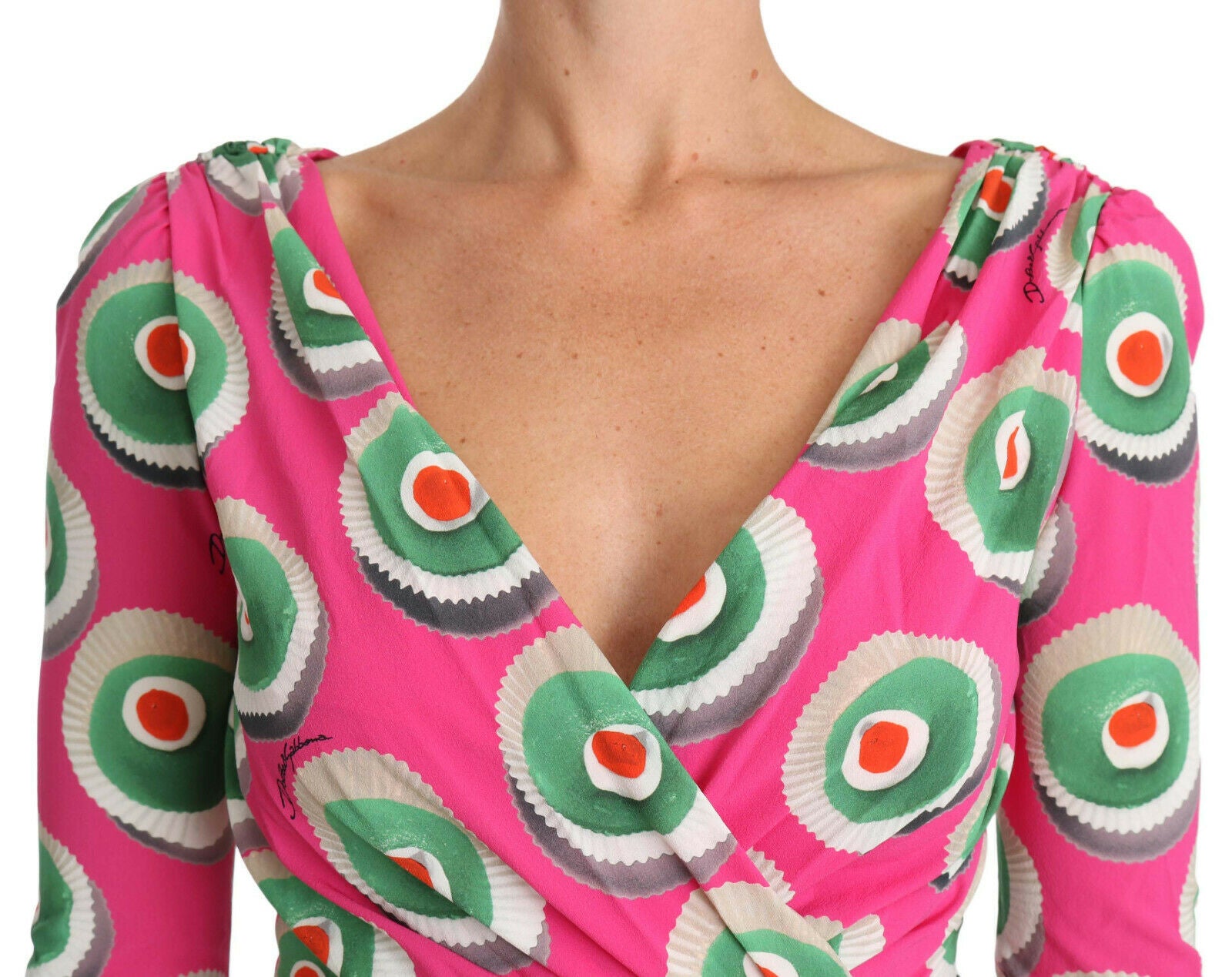 Pink silk cupcake sheath dress by Dolce & Gabbana featuring a fitted stretch design and elegant, smooth fabric.
