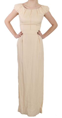 Beige silk column gown with cap sleeves by Dolce & Gabbana, elegant evening dress with a sleek, flowing silhouette.