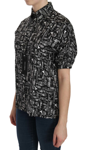 Black Dolce & Gabbana collared blouse shirt with musical instrument print, long sleeves, and tailored fit.