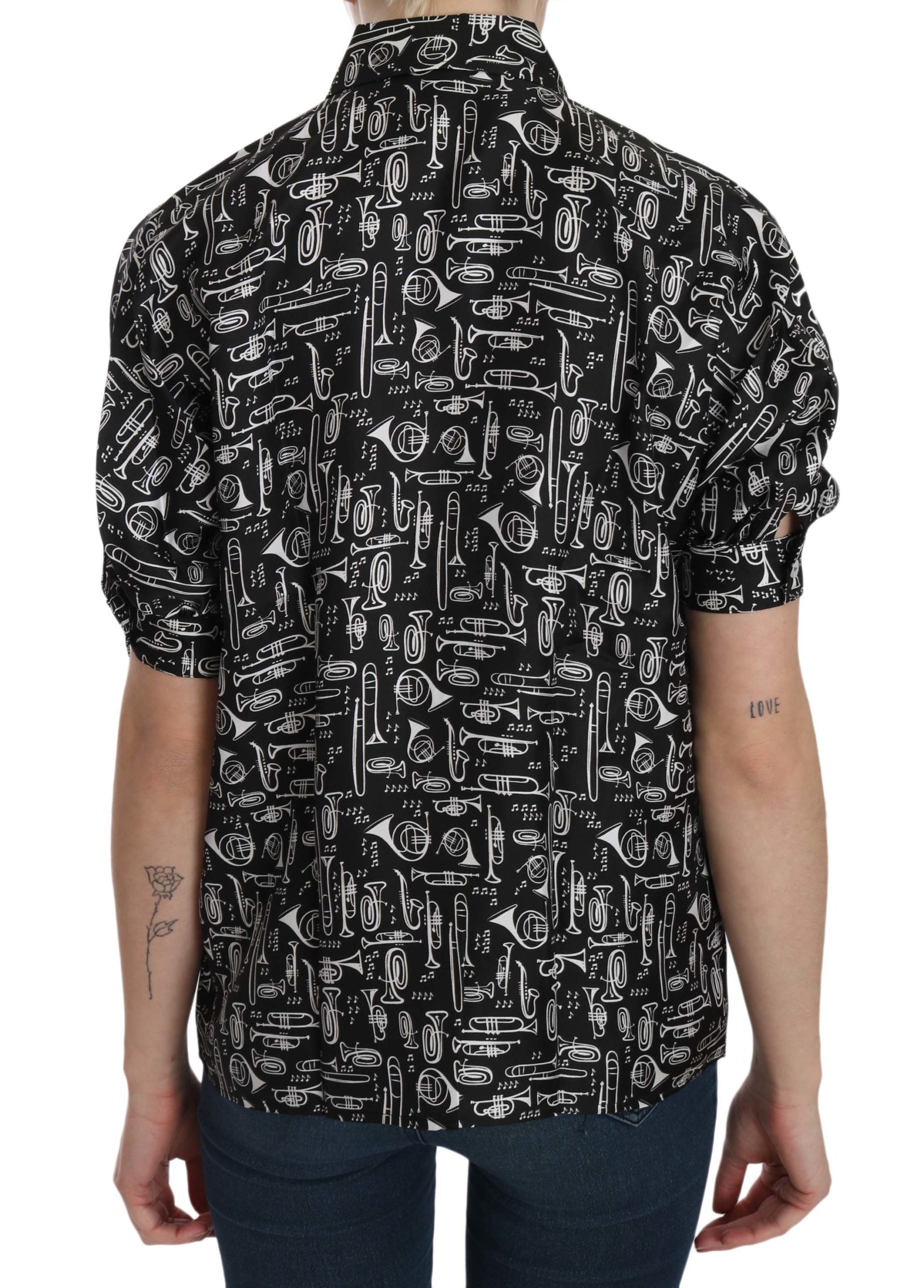 Black Dolce & Gabbana collared blouse shirt with musical instrument detail, stylish and elegant for women.