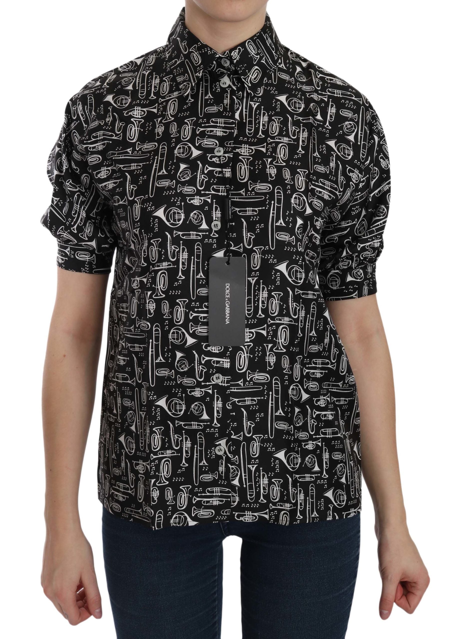 Black Dolce & Gabbana musical instrument-inspired collared blouse shirt with button details and long sleeves.