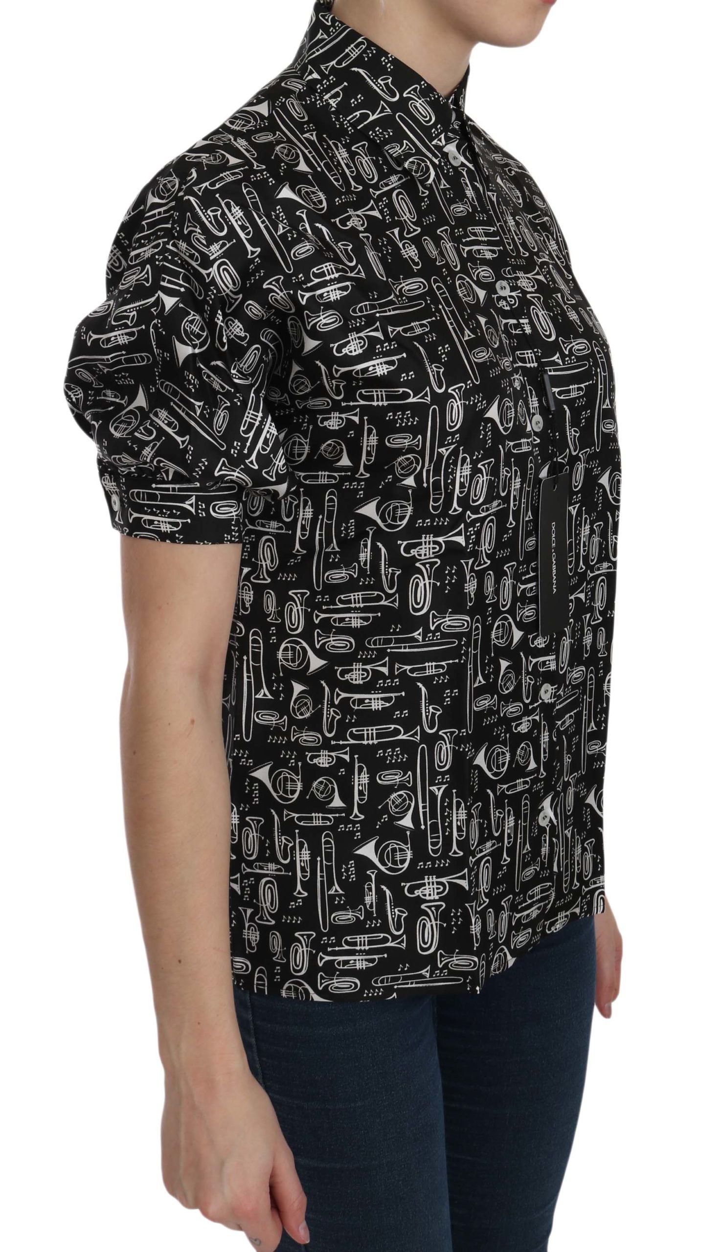 Black collared blouse shirt with musical instrument pattern by Dolce & Gabbana, featuring a stylish and sophisticated design.