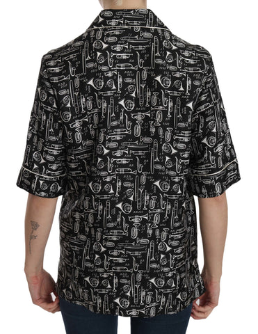 Black musical instrument print silk top by Dolce & Gabbana, featuring a stylish design and smooth fabric.