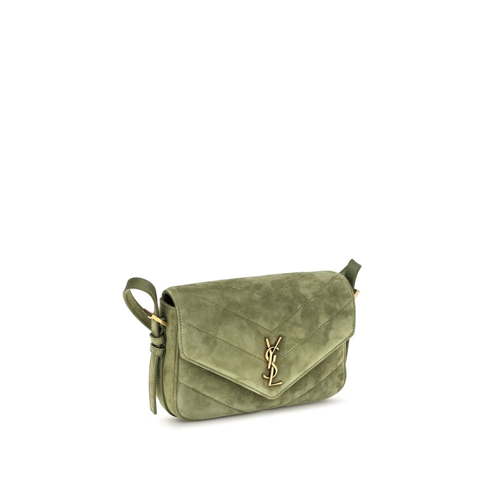 Bicolor suede leather shoulder bag by Saint Laurent featuring a sleek design and shoulder strap on a plain background.