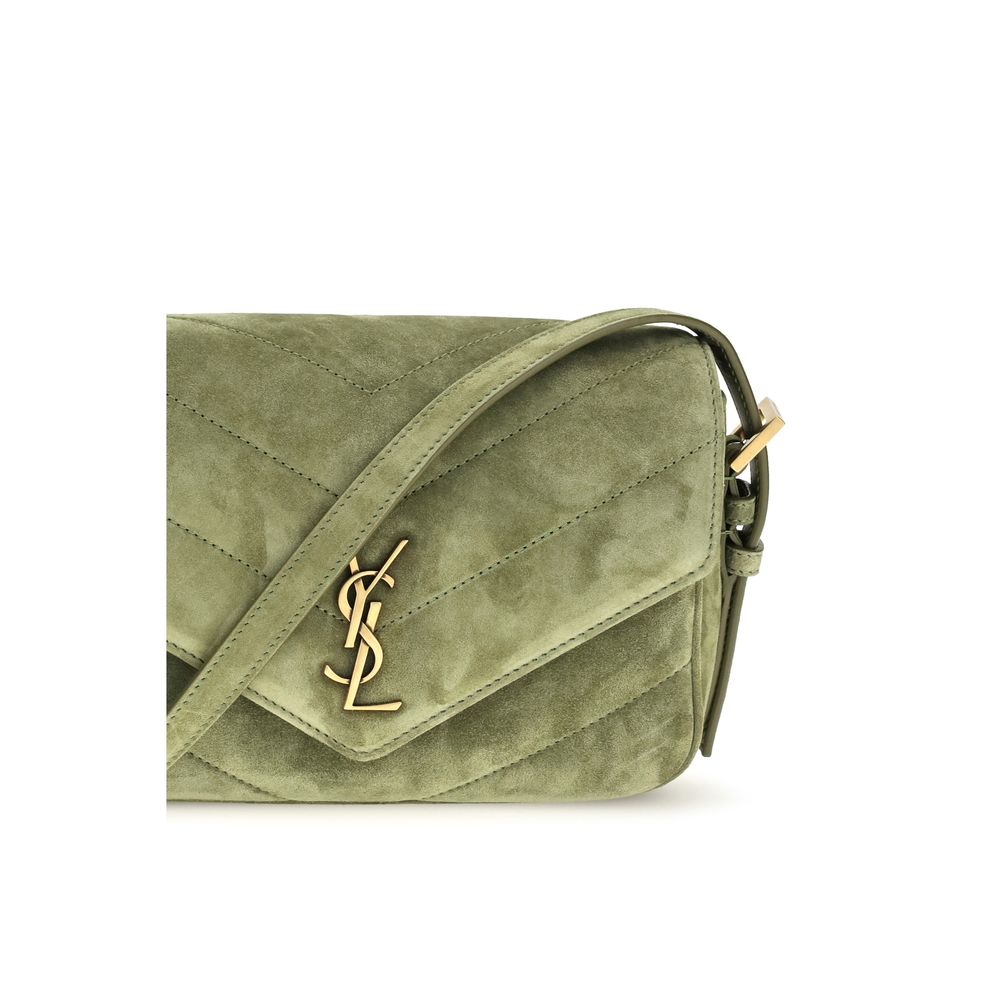 Saint Laurent bicolor suede leather shoulder bag with sleek design and adjustable strap, showcasing stylish craftsmanship.