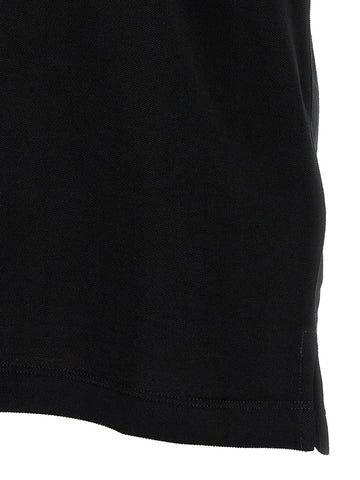 Black cotton polo shirt by Fendi featuring a classic collar and short sleeves, displayed on a plain background.