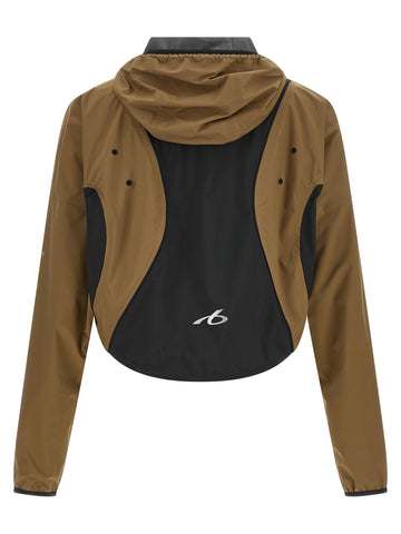 Balenciaga brown polyester shell jacket with a sleek, modern design and adjustable hood, suitable for outdoor wear.