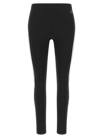 Black polyamide leggings by Balenciaga, close-up of fitted high-waisted design with smooth fabric and subtle branding.