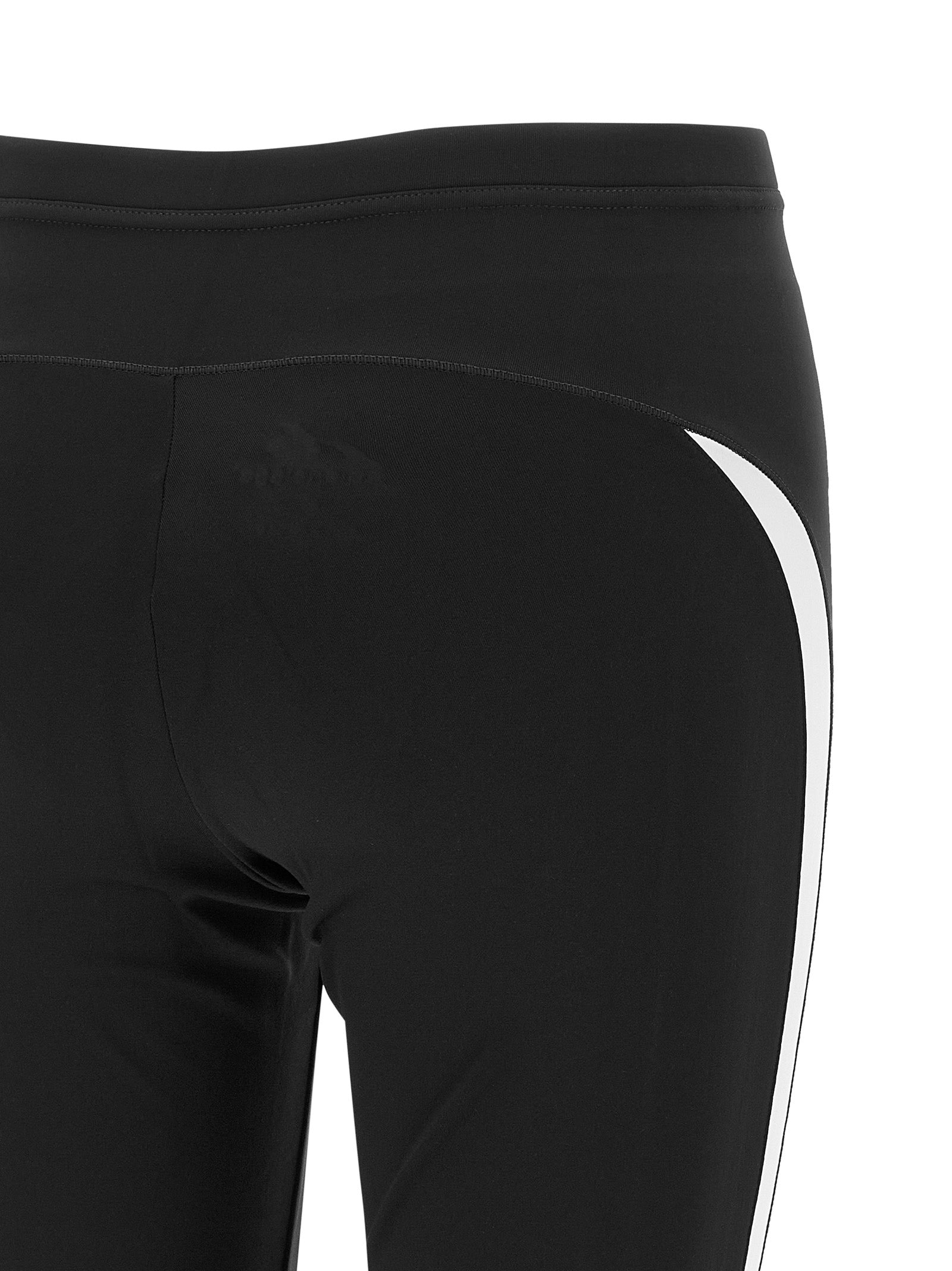 Black polyamide leggings by Balenciaga, close-up view showing sleek fabric and fitted design.