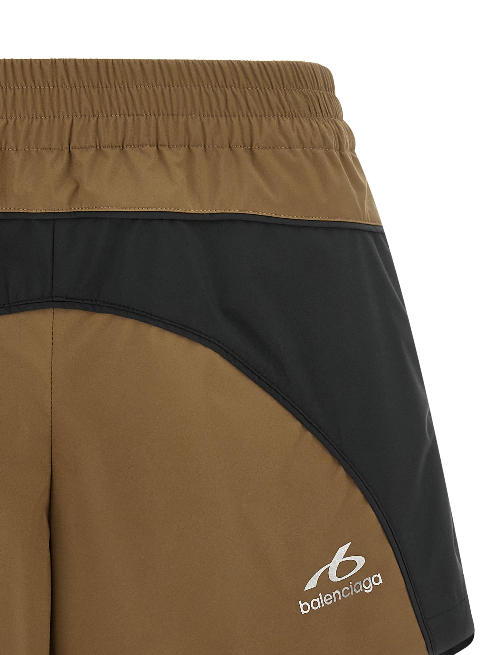 Balenciaga brown polyester Bermuda shorts featuring a casual fit and classic design, suitable for everyday wear.
