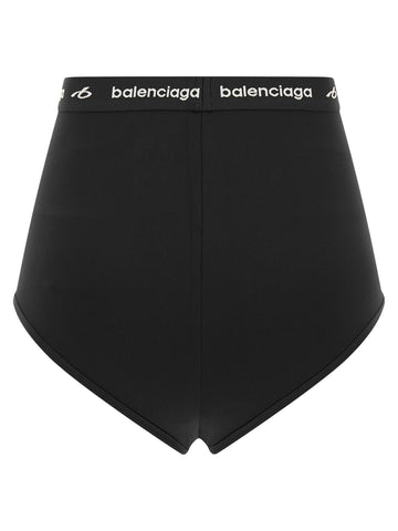 Black polyamide briefs by Balenciaga, featuring a sleek fit and minimal design, shown on a model.