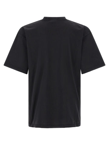 Black cotton T-shirt by Balenciaga displayed on a hanger with a plain background.