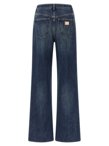 Blue cotton denim jeans by Dolce & Gabbana, featuring classic five-pocket design and slim fit style.