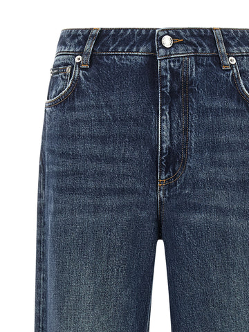 Blue cotton denim jeans by Dolce & Gabbana, featuring classic five-pocket design and slim fit style.