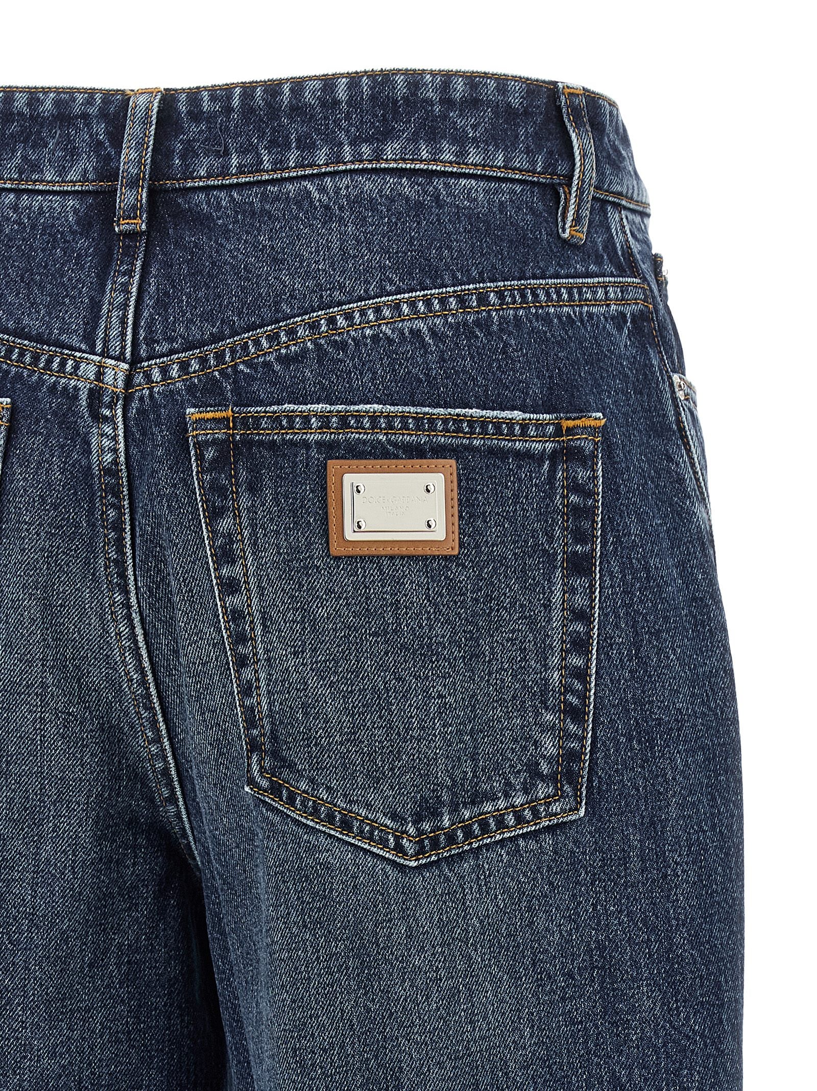 Blue cotton denim jeans by Dolce & Gabbana, featuring classic five-pocket design and a slim fit silhouette.