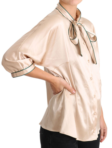 Beige ribbon silk stretch top blouse by Dolce & Gabbana, featuring elegant silk fabric and a fitted silhouette.