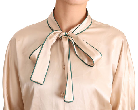 Beige silk stretch top with ribbon detailing from Dolce & Gabbana, featuring a stylish blouse with elegant design.