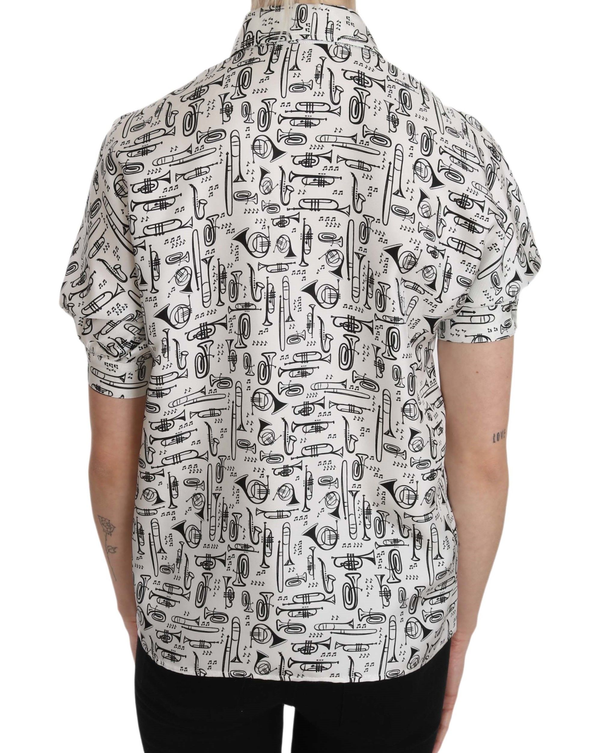 Dolce & Gabbana silk blouse with trumpet print, button-front design, stylish button-up top for elegant casual wear.
