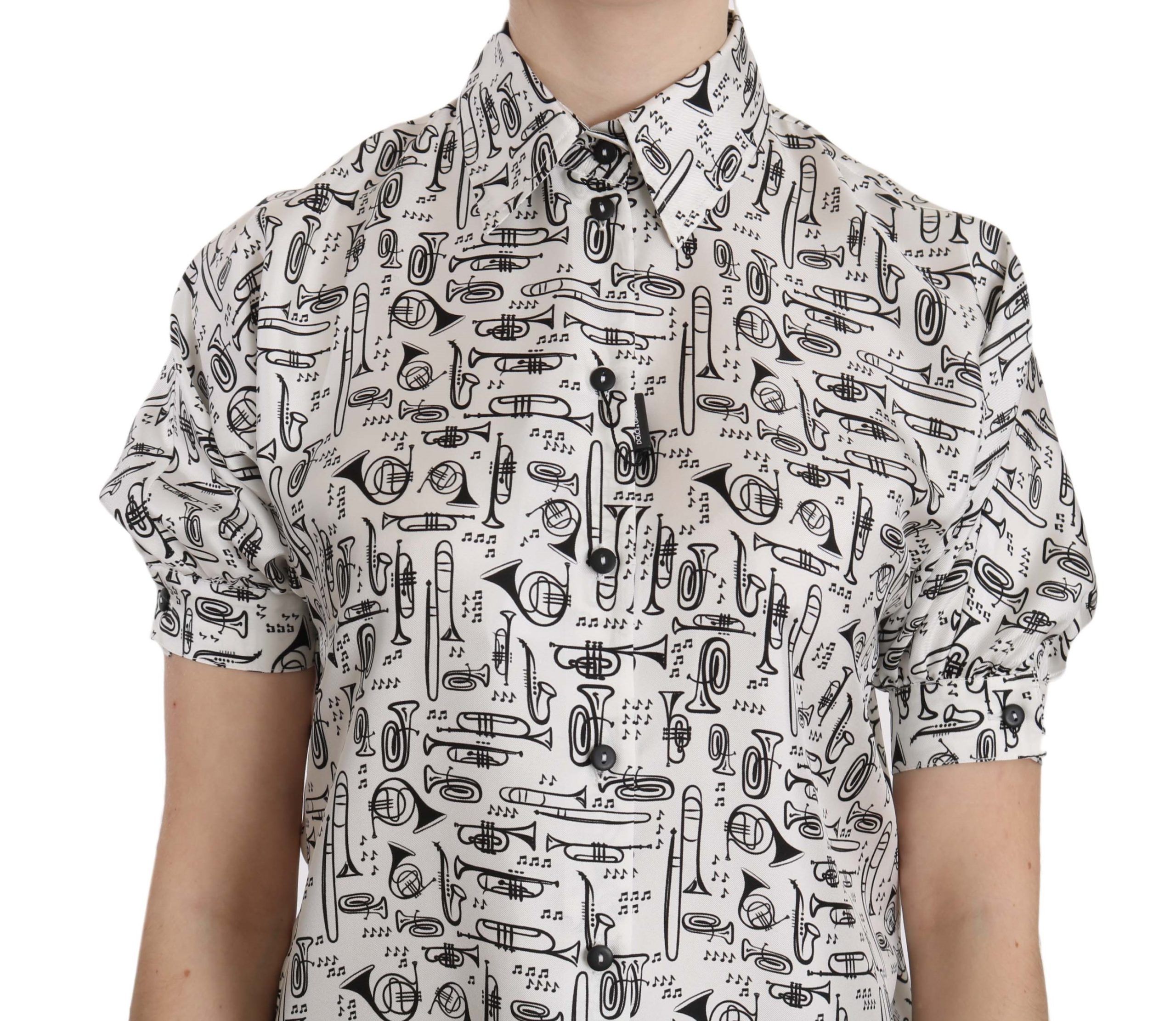 Dolce & Gabbana silk blouse with trumpet print and button front, stylish button-up top for elegant casual wear.
