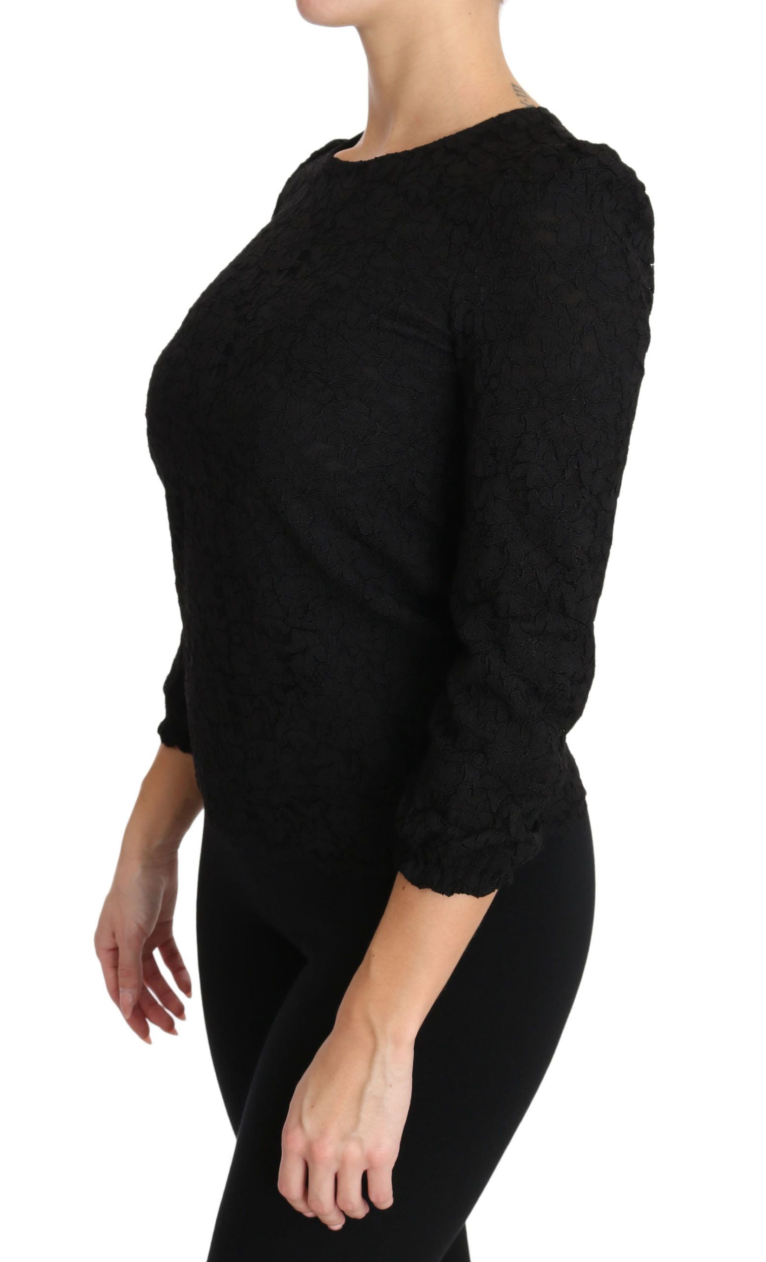 Black floral lace zipper top blouse by Dolce & Gabbana, featuring intricate lace details and a stylish front zipper closure.
