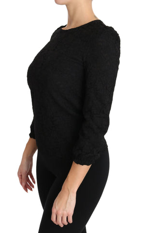 Black floral lace zipper top blouse by Dolce & Gabbana, featuring intricate lace details and a stylish front zipper closure.