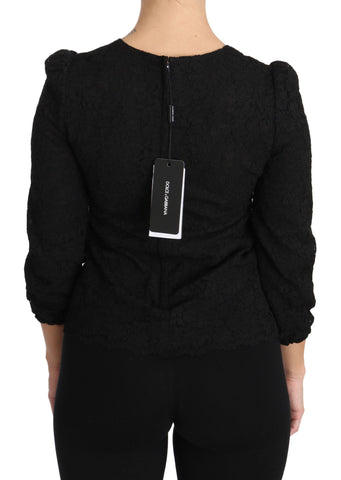 Black floral lace zipper top blouse by Dolce & Gabbana, featuring intricate lace details and a stylish front zipper.