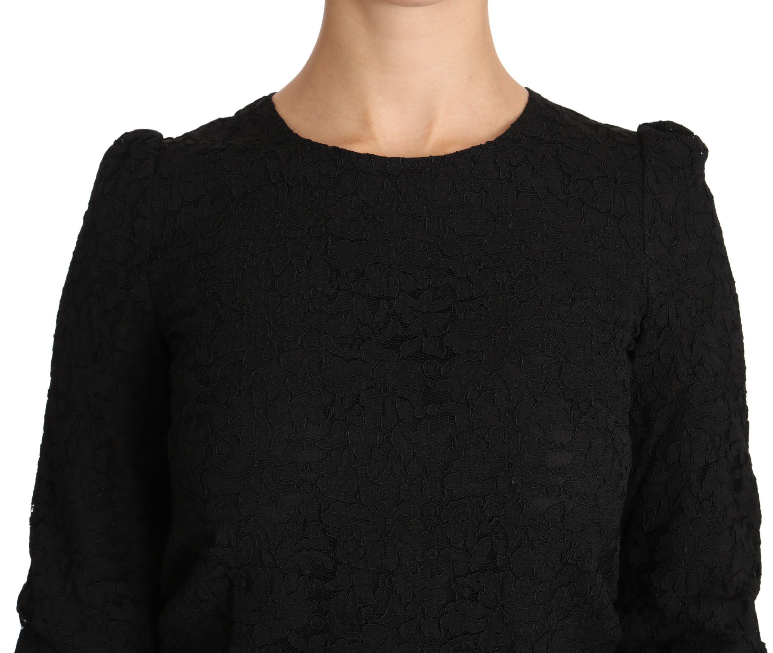 Black floral lace zipper blouse by Dolce & Gabbana with intricate lace details and a stylish front zipper closure.