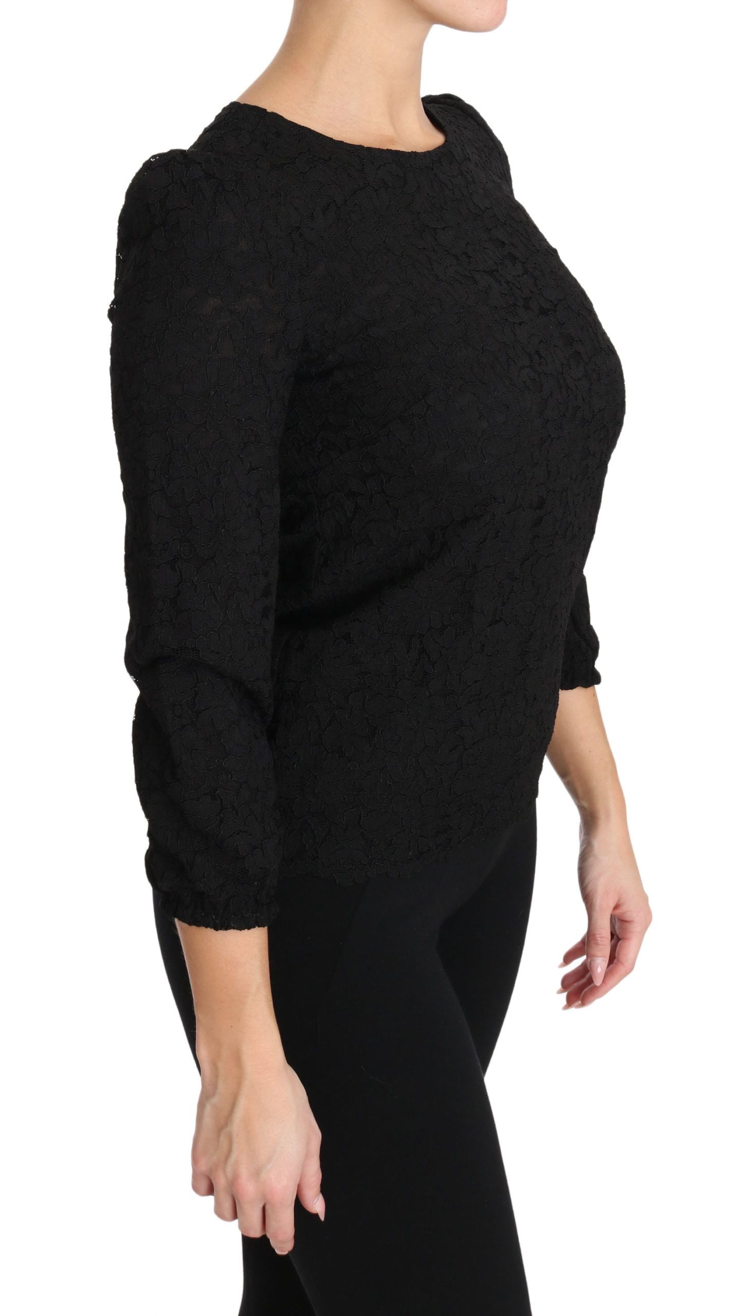 Black floral lace zipper top blouse by Dolce & Gabbana with intricate lace details and a front zipper closure.
