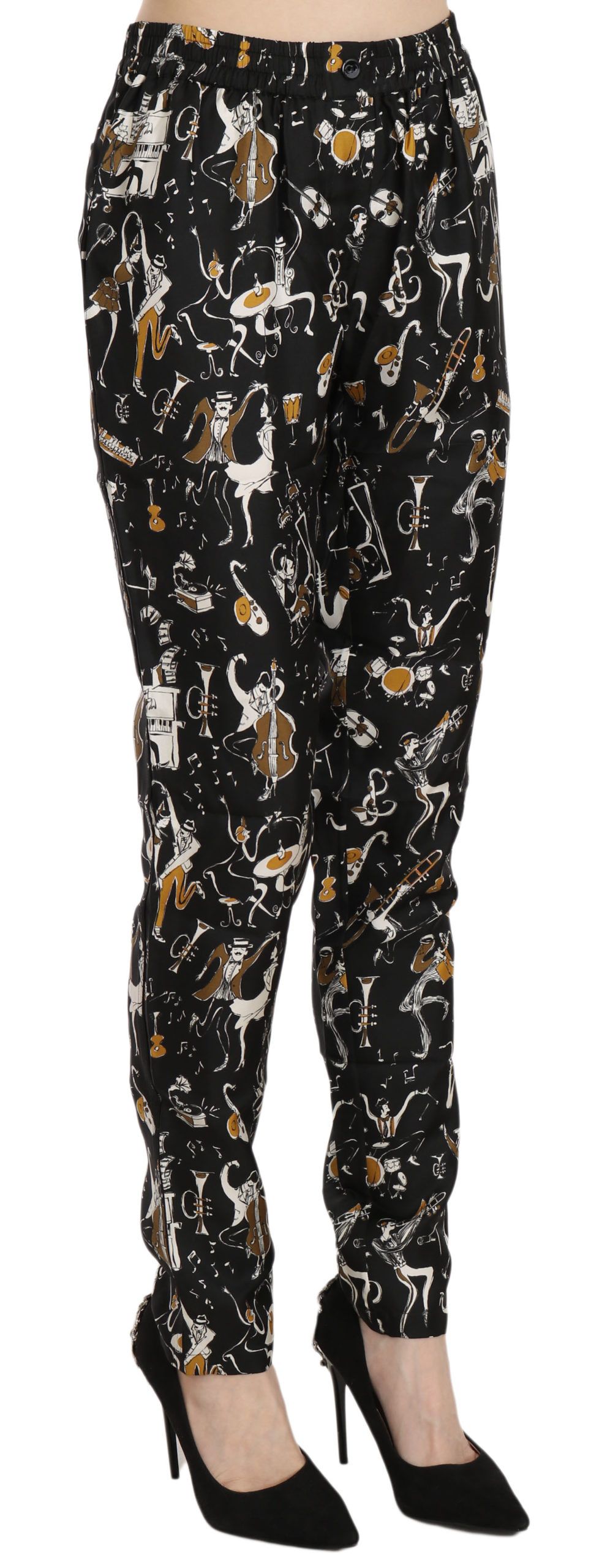 Black jazz club print high waist tapered pants by Dolce & Gabbana featuring bold pattern and tailored fit.