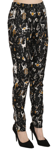 Black jazz club print high waist tapered pants by Dolce & Gabbana featuring bold pattern and tailored fit.