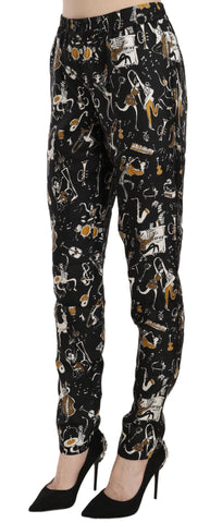 Black high waist tapered pants with jazz club print by Dolce & Gabbana, featuring a stylish, fitted design and elegant detailing.