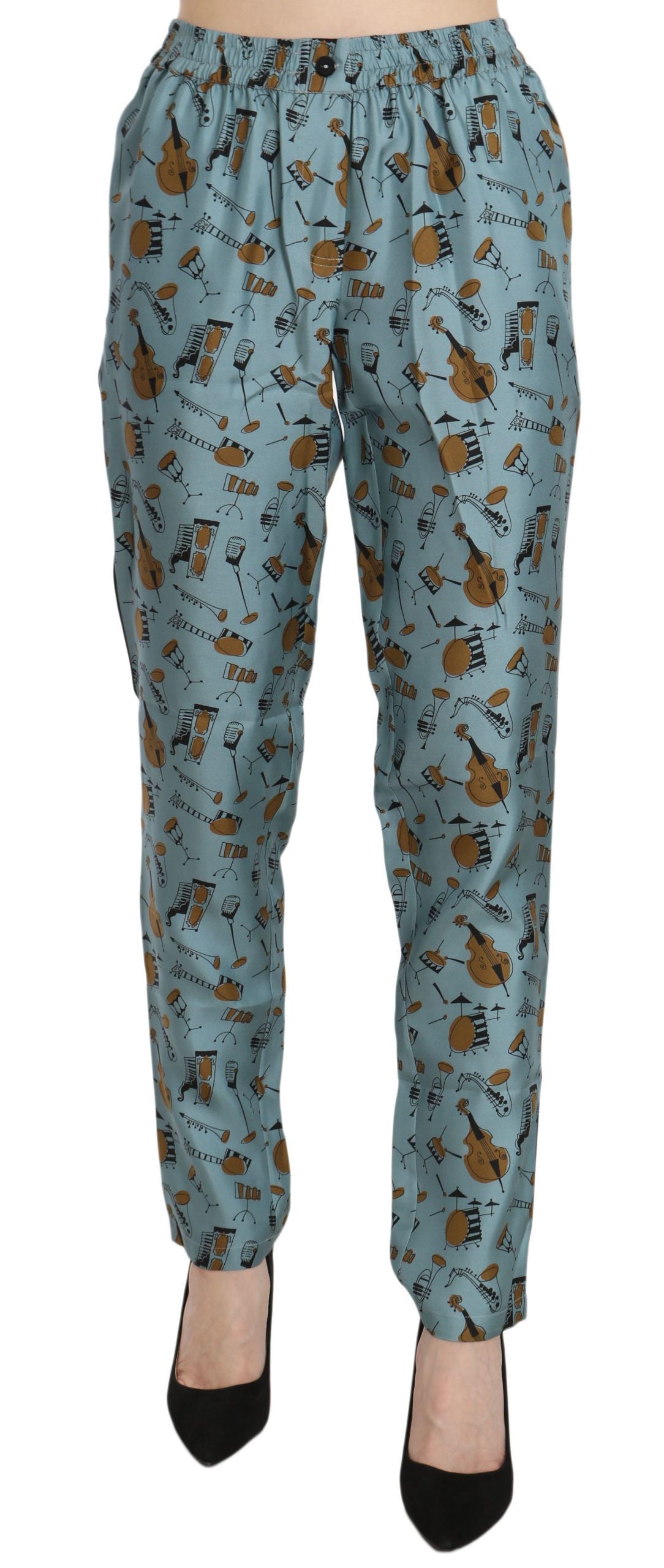 Blue musical instruments print tapered pants by Dolce & Gabbana featuring vibrant pattern and slim fit design.